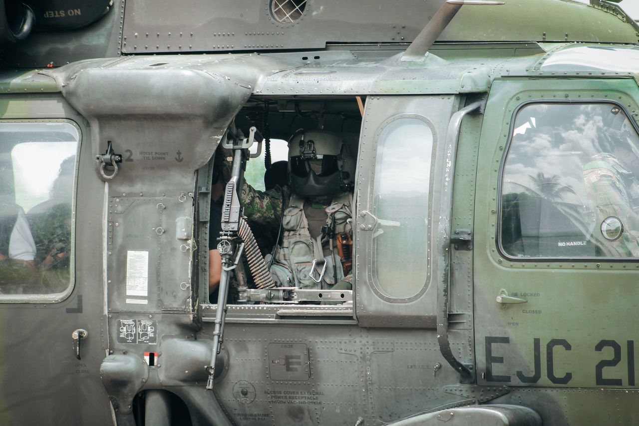 A camouflage combat helmet